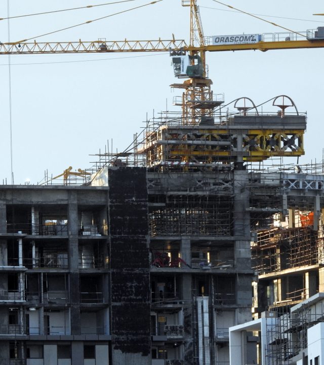 Giza, Egypt, February 4 2023: A construction site of new high rise in Egypt by Orascom construction Zed city Sheikh Zayed, new real estate Egyptian projects and new residential towers, selective focus
